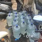 Delivery boy for bisleri water bottle supply by Electric bike