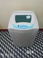 Id-989807.    Samsung top load white colour washing machine