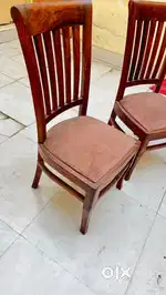 Polished wooden chairs and table