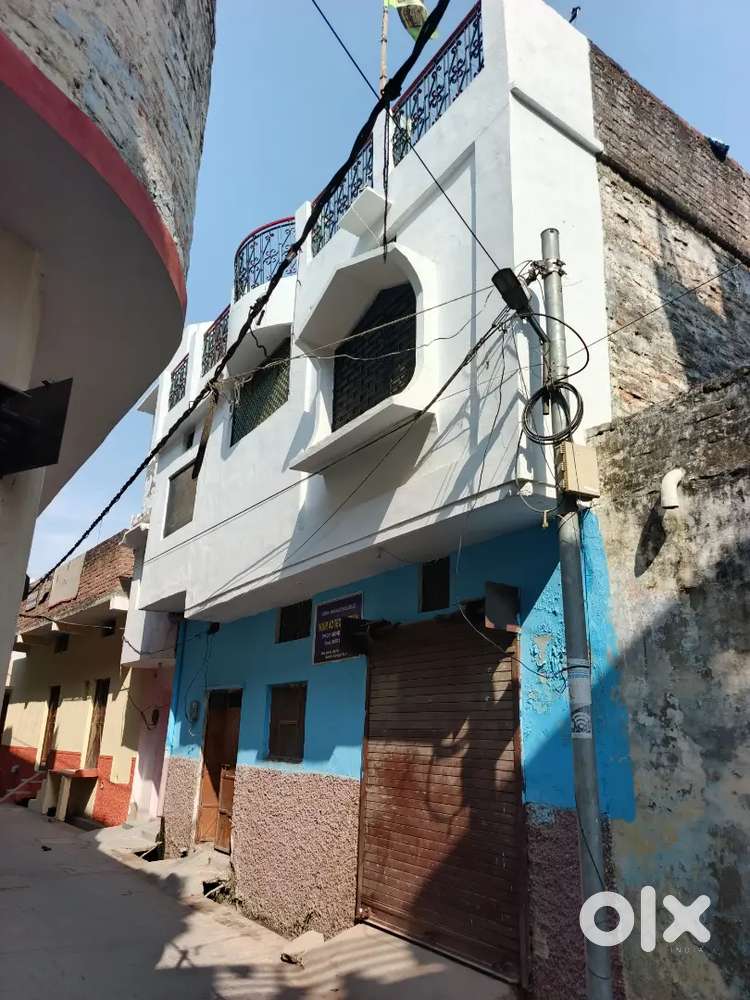 100 Gaz ka Makan hai Argent Sell Karna hai Ek Shop bhi hai