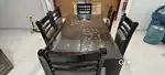 Sleek 6-seater Glass Top Dining Table – Modern Look, Great Condition!