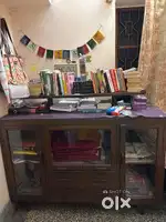 Crockery unit with glass doors, shelves and drawers