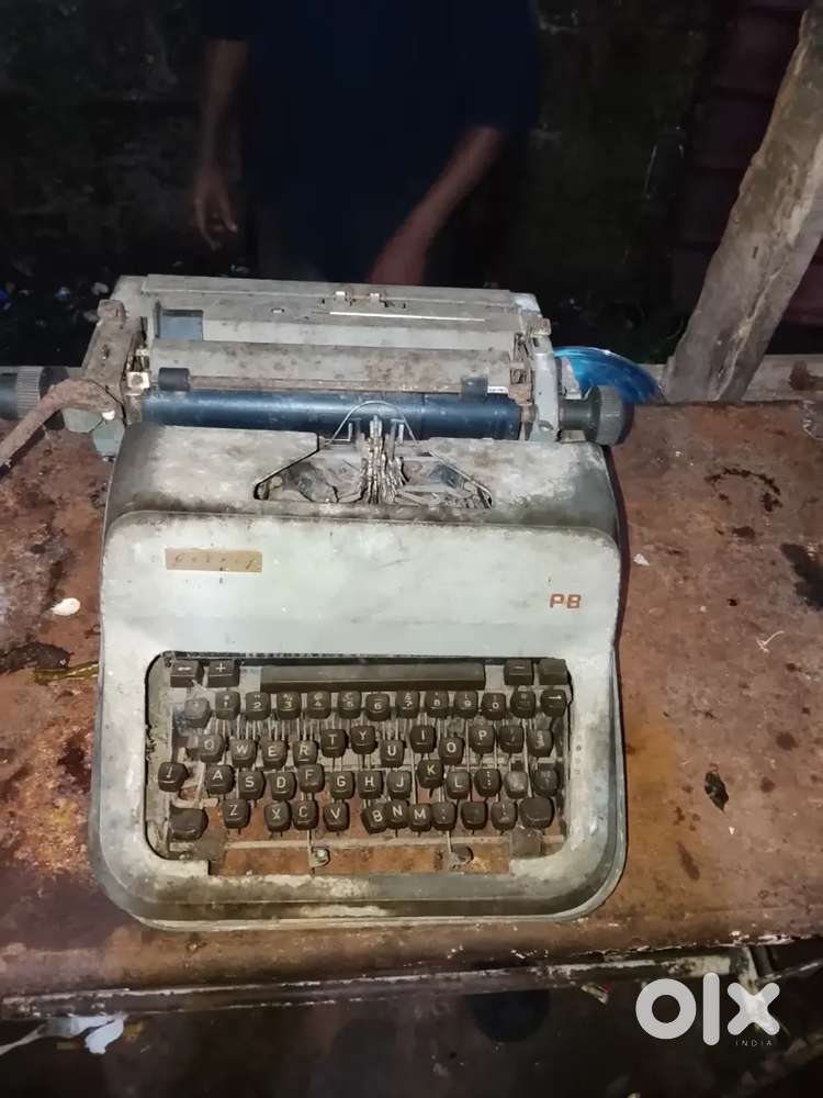Vintage tiping machine