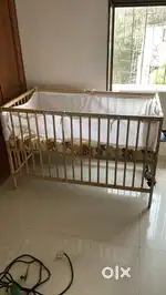 Wooden baby crib