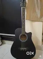 Acoustic Guitar( Black color with capo)
