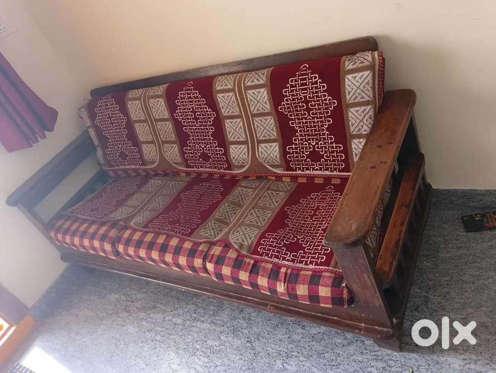 5 people sitting wooden sofa 15k