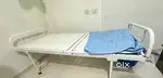 Iron manual hospital cot bed