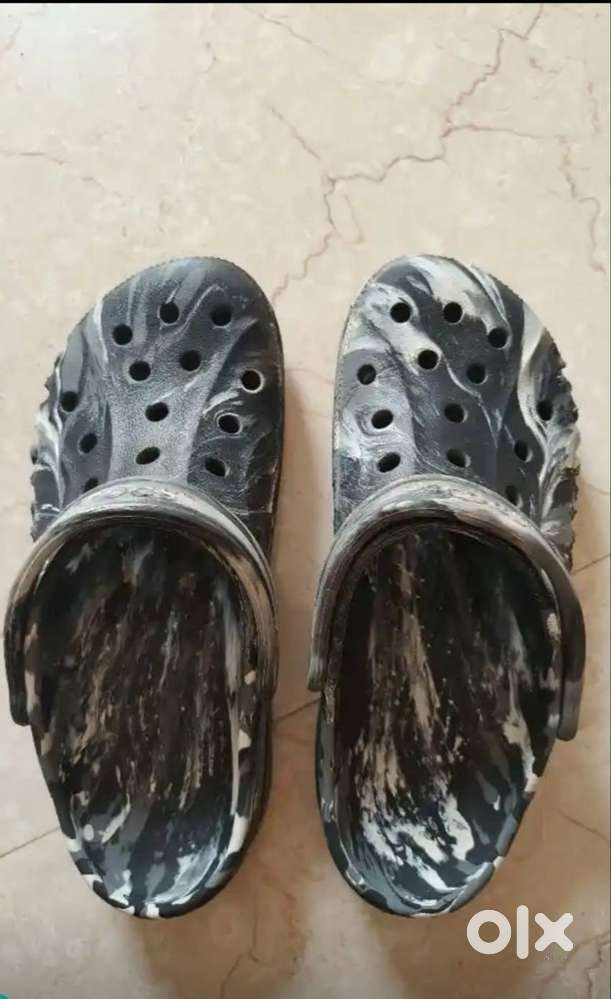 Crocs Classic Marbled Clogs in a black and white colorway