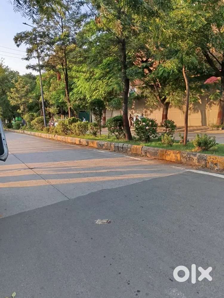 Commercial plot for sale men road brilliant aura ke samne.
