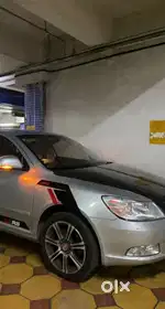 Skoda Laura Pure Petrol 2011