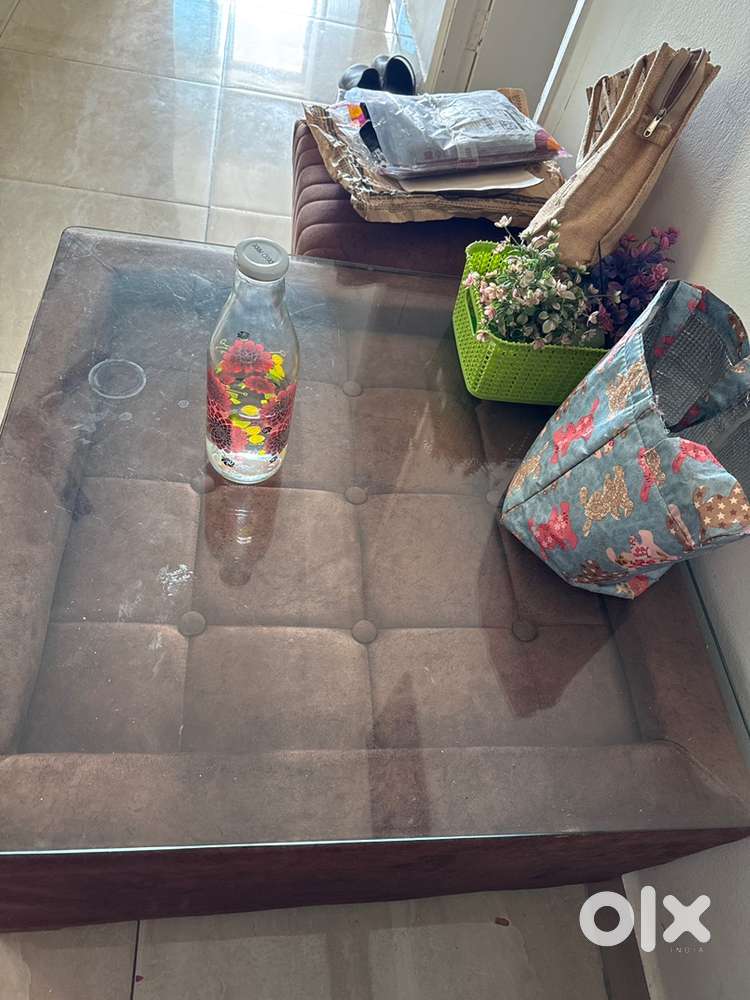 L shape sofa with centre table