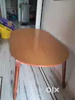 Teak wooden dining table is for sale