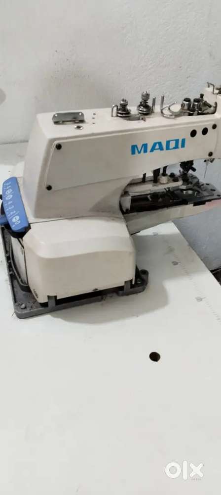 New kaj button machine