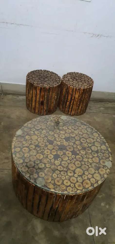 ONE ROUND TABLE WITH FOUR STOOL.. LOOK LIKE NEW JUST 18 MONTHS OLD