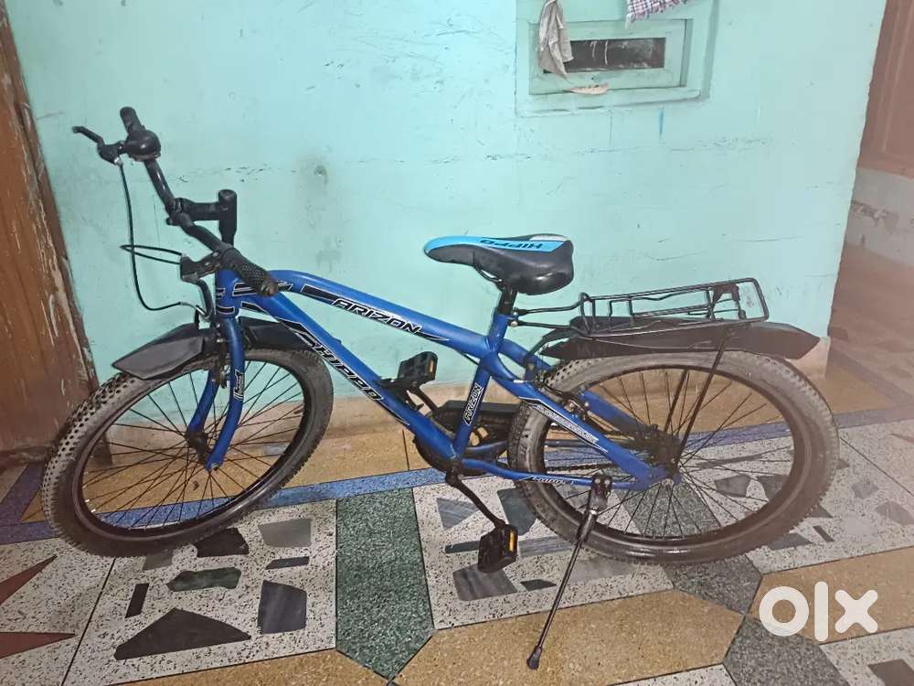 A blue colour boys cycle