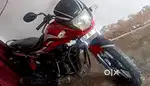 Red colour Hero Passion Bike hai,