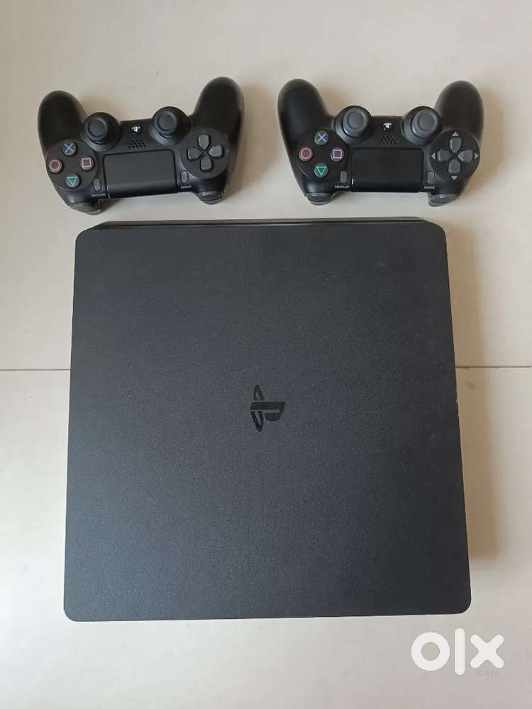PS 4 Slim 1 TB with 2 Remotes