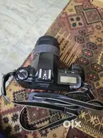 Canon EOS Rebel XS 35mm film with 35-80mm lens