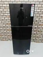 Haier 258 litres black colour double door auto deforest refrigerator