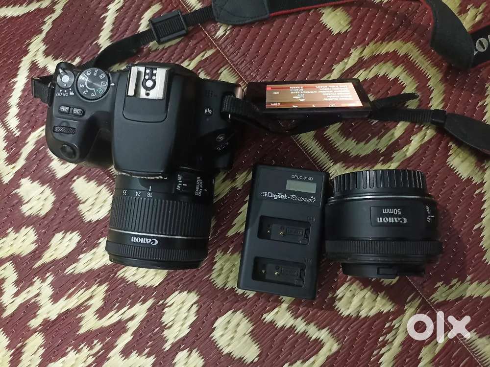 Canon 200d with 18-55mm and  50mm f 1.8 lens