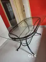 Dining table  and single wooden sofa