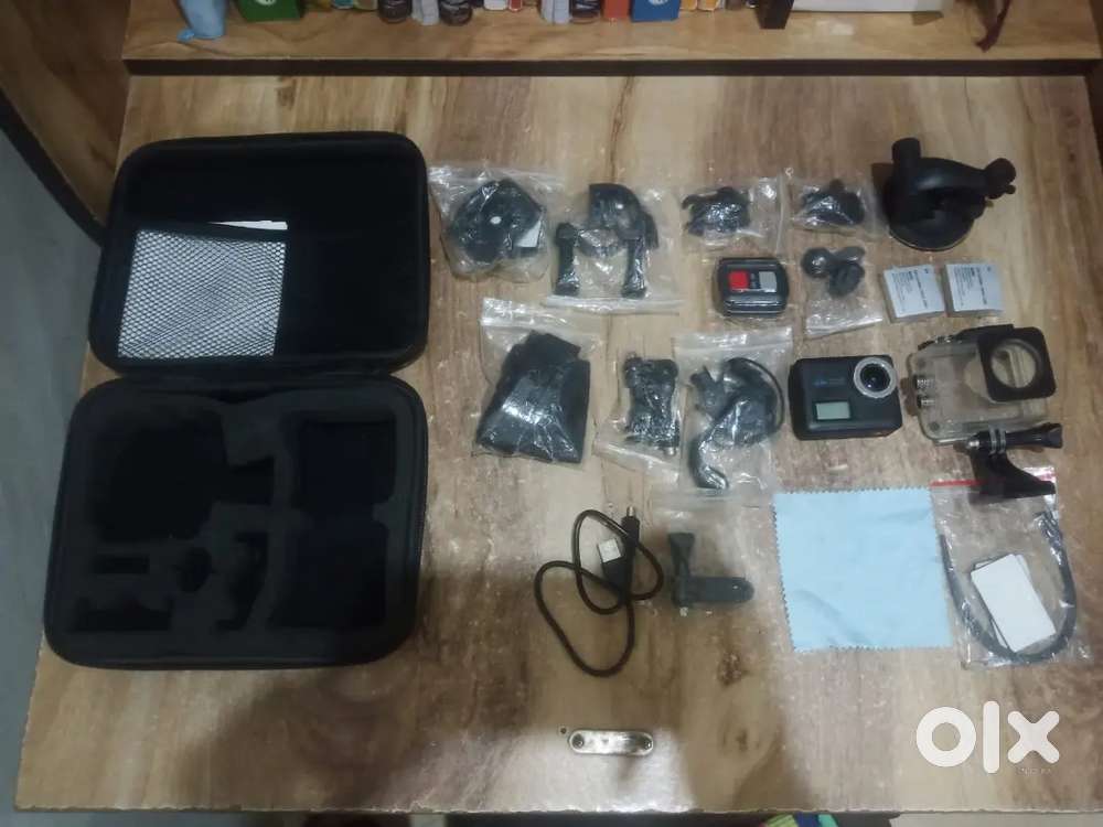 Action camera for vlog with non used accessories and car dashcam mount