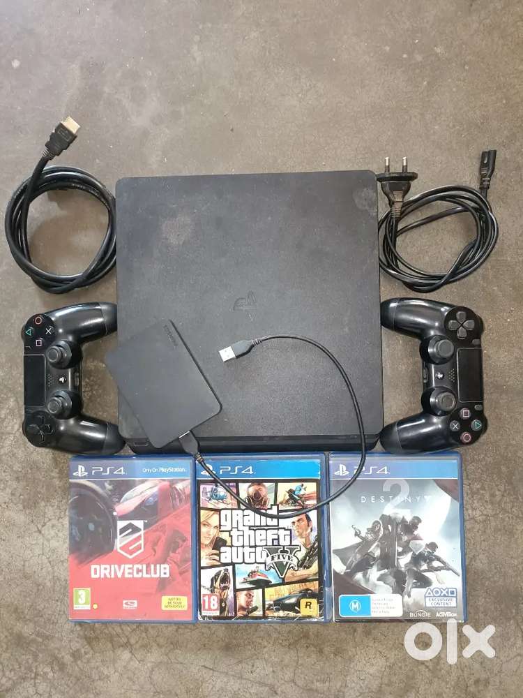 PS4 Slim 500 GB + 1 TB External hard disk, 2 Remote and Games