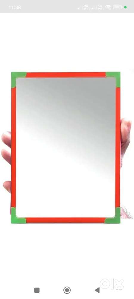 rectangular mirror with a distinct frame.