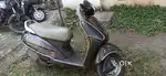 Grey scooty well maintain.