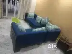 L shape sofa with pillows