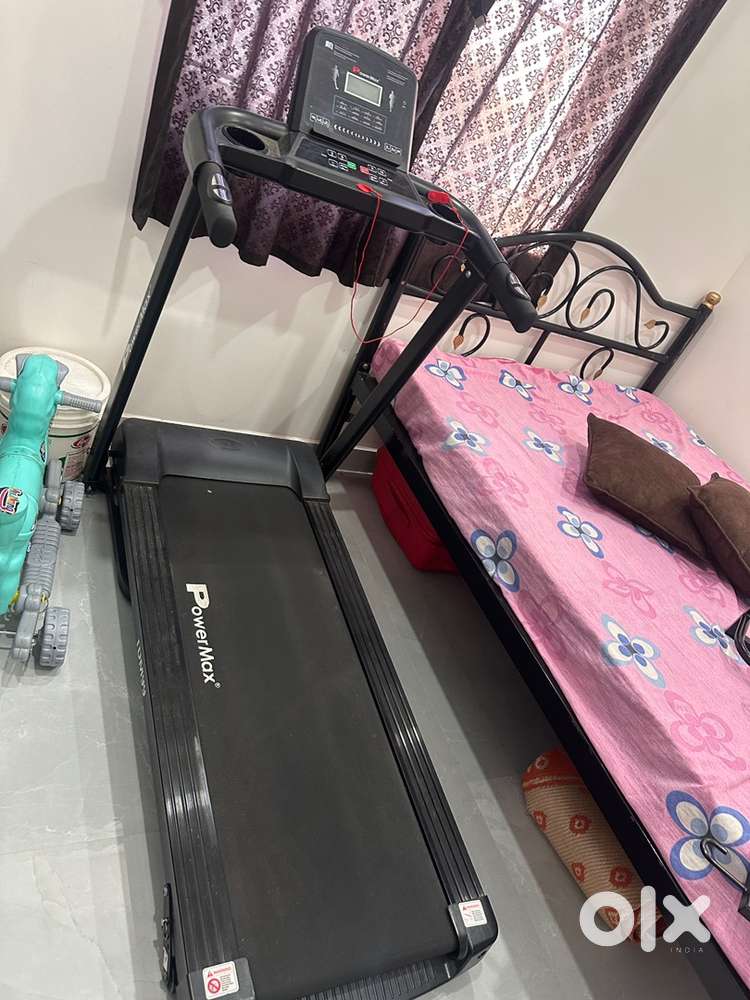 POWERMAX TDM 99 Treadmill.  One year old and used very limited.