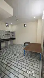 Semi furnished Room with Kitchen,Almirah and Bed