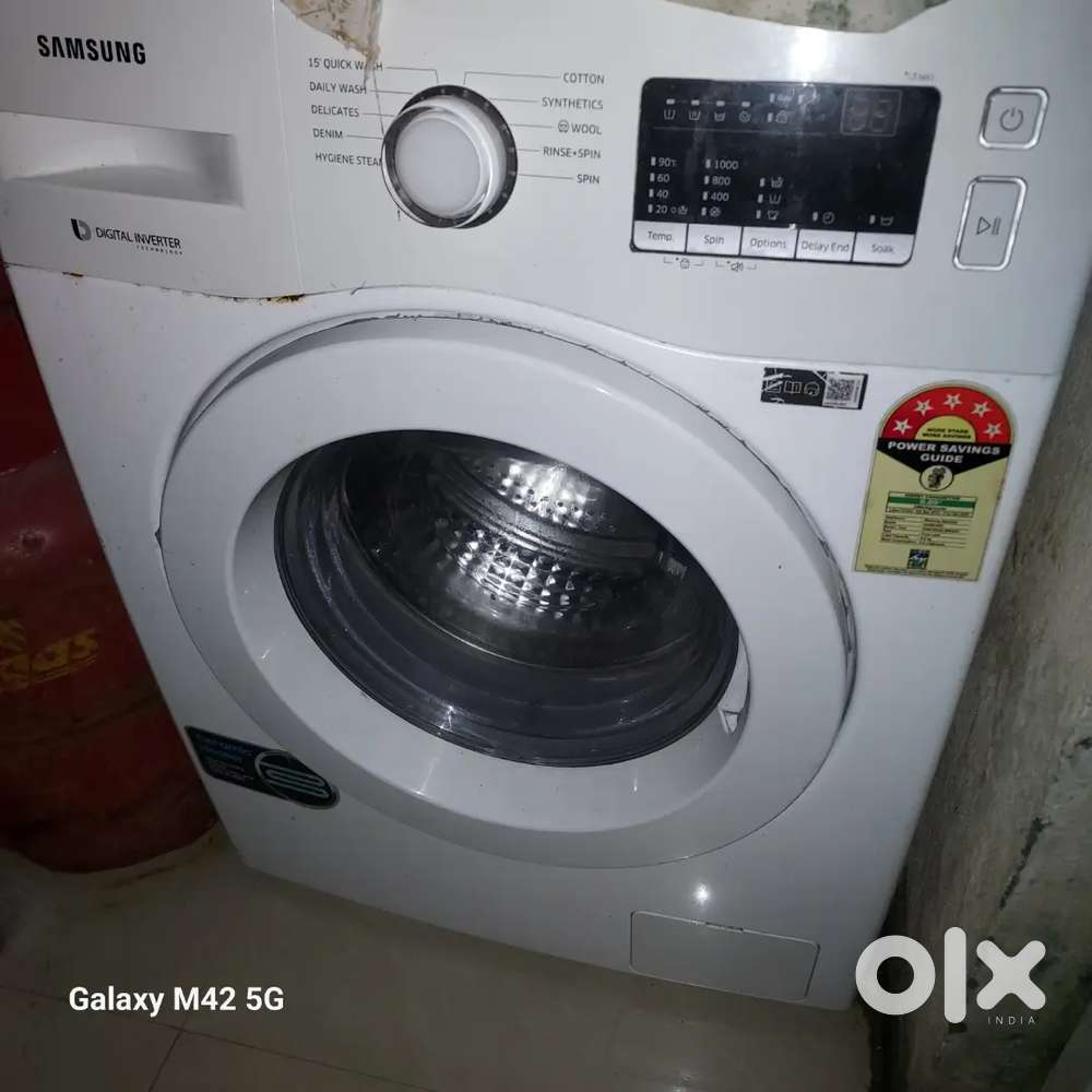 Washinh machine farnt door inverter samsung 2 yesh old