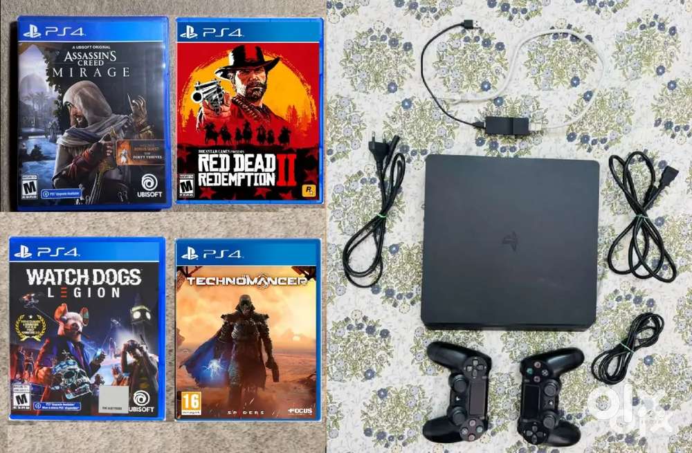 PS4 PLAYSTATION 4 SLIM 1TB WITH 4 DVDs - 5MNTH WRNTY