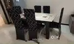 DINING TABLE WITH 6 CHAIRS in Tip top condition & Table chairs covers