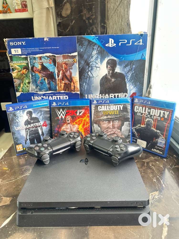 PS4 1TB WITH 2 ORIGINAL SONY JOYSTICKS