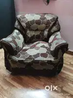 Single seater sofa  , slightly broken from on side