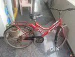 It is in red cycle with 6 gears
