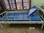 Hospital lifting bed