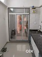 1bhk Sami Furnished flat Sale With Parking Rs..60Lac . Kamothe Sec,18