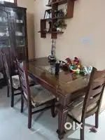 Teak wood dining table with six chairs