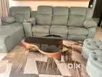 Sofa recliner with lounger and centre table