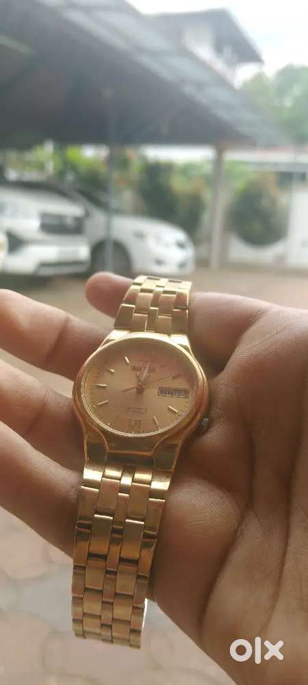 Seiko 5 automatic gold dial watch