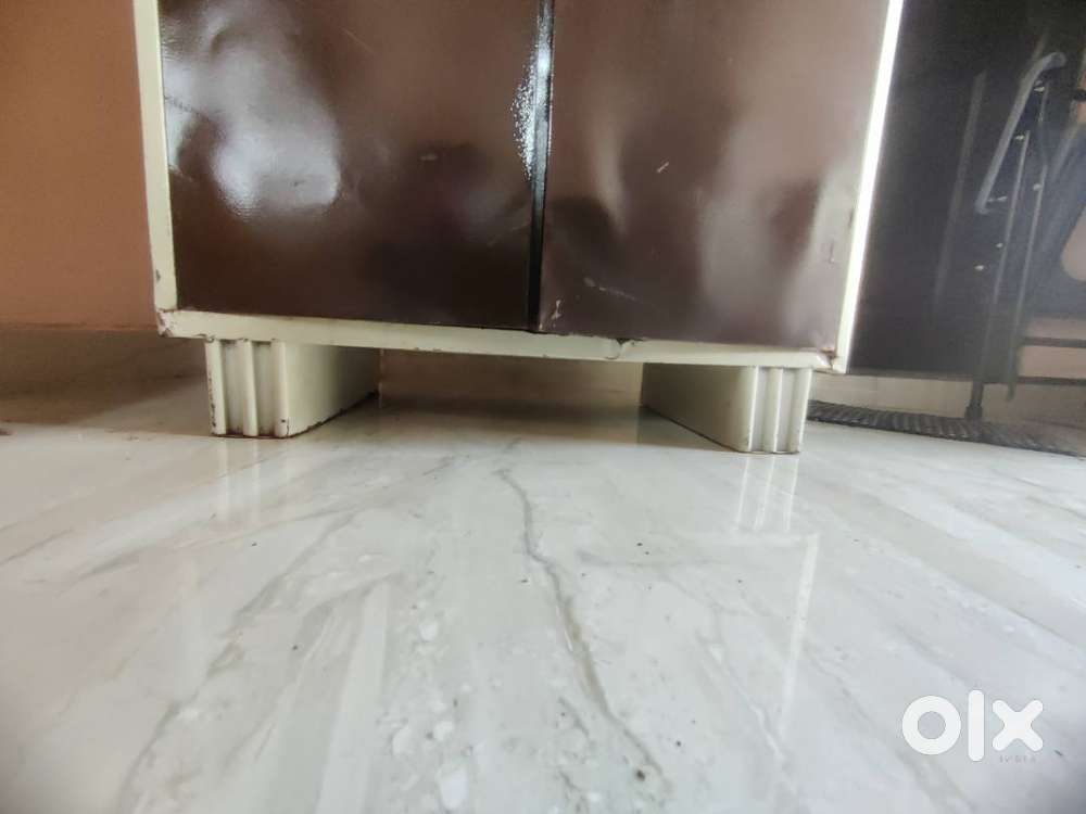 Steel cupboard with mirror