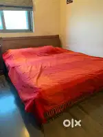 King-Sized Bed convertible into Single Bed with internal storage