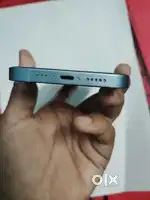 iPhone 14 with charger