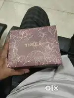 Un used timex couple watch