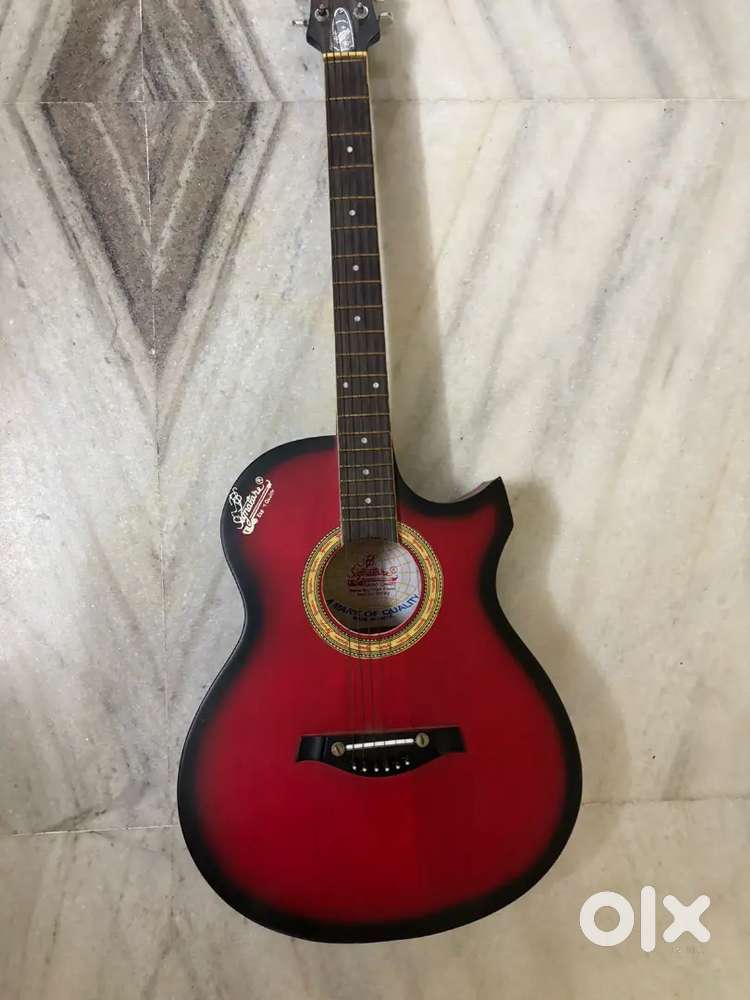 Guitar acoustic red