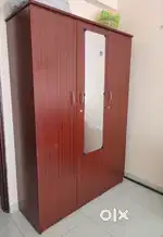 Three door wardrobe in mint condition.
