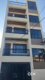 Property with rental income 170 gaz 2bhk×3 stilt parking hai near road